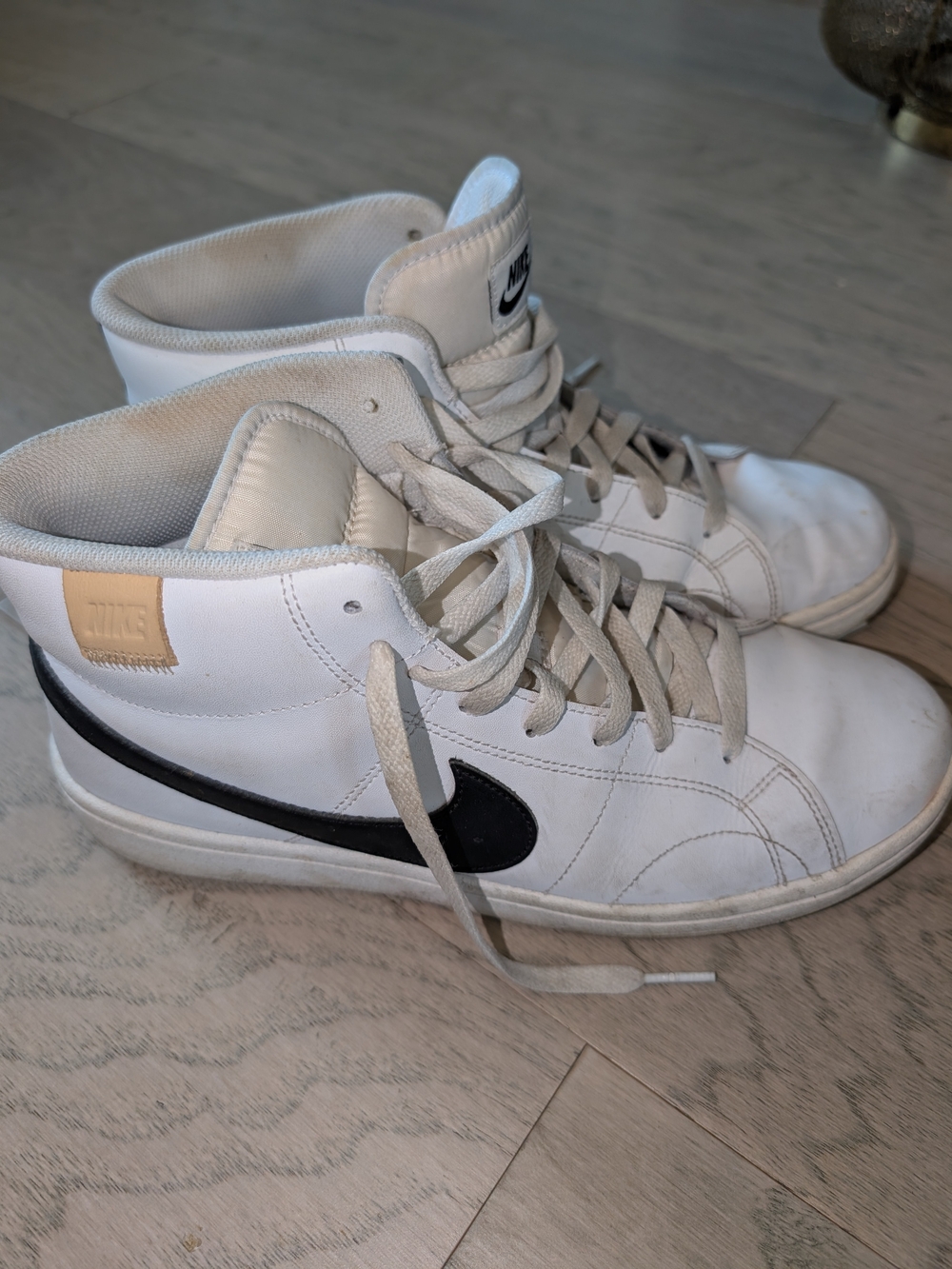 Nike Men’s White High-Top Sneakers with Black Swoosh